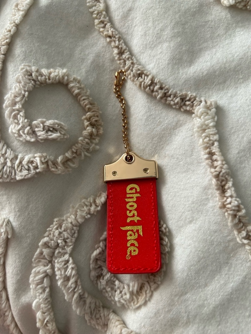 Gold red ghostface keychain
